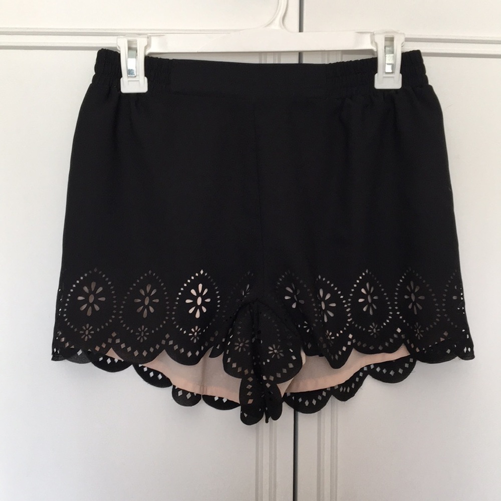 Black shorts with floral edging